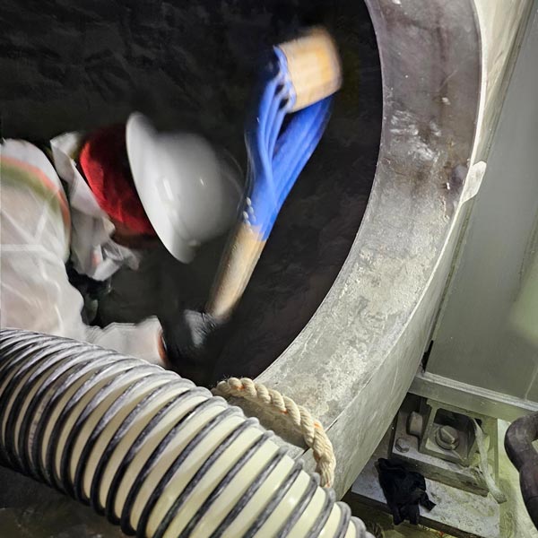 A worker working in confined space entry in Raleigh, NC