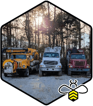 Vacuum trucks in a row at sunrise in Raleigh & Fayetteville, NC
